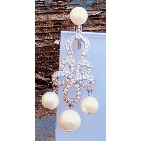 Silver Tone Bow Chandelier Clip On Earrings with Faux Pearls and Rhinestones - Picture 2 of 4